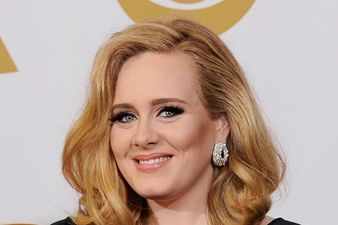 Adele Wearing Gold Band on Wedding Ring Finger