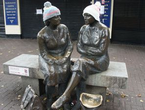 The Capital’s Famous Stone Faces Wrap Up As The Irish Get Their Knit On