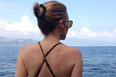 Singer Shows Off Famous Derriere In Holiday Snap