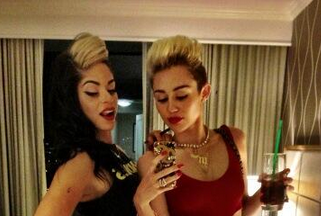 PICTURE – Pretty Woman, Twerkin Down The Street – Miley Models Similar Outfit From The Movie In Twitter Snap