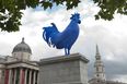 PICTURE – Large Blue Cock Erected In London’s Trafalgar Square
