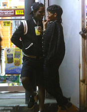 Spotted: Rihanna Cosies Up To Rapper