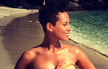 She’s On Fire: Singer Sizzles On Beach in Rio de Janeiro