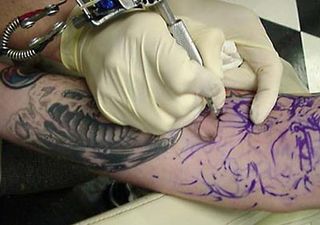 PICTURE: Pain Is Temporary? – Woman Sports A Very Unfortunate Permanent Tattoo