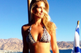 Raising The Bar: Supermodel Shows Off Bikini Bod