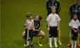 PICTURE – Swedish Football Player Comforts Frightened Child At World Cup Qualifying Match
