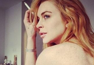 Lindsay Lohan Shares Topless Twitter Pic