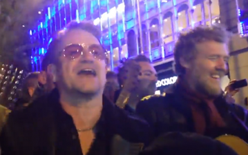 VIDEO: Glen Hansard And Bono Spread Some Christmas Cheer Busking On Grafton Street