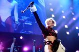 Expect The Unexpected! Miley Cyrus Hands Out Cash At One Of Her Concerts