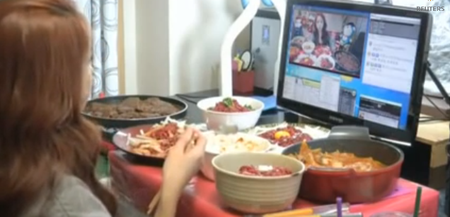 Watch: Woman Earns Money by Eating Live on Webcam in South Korea’s Latest Food Trend