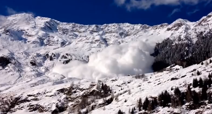 VIDEO: Farmer Captures Enormous Snow Avalanche Creeping Down The Italian Alps