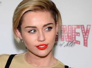 What Has She Done Now? Miley Unveils New Tattoo