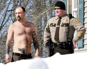 Man In Maine Woken Up To Fully Armed Policeman Because of His Tattoo?