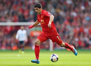 PICTURE: Liverpool Footballer Takes Time Out to Play With Young Fan With Down Syndrome ​