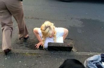 “I Jumped Down To Get It” Girl Gets Stuck In Drain After She Tries To Recover iPhone With Her Feet