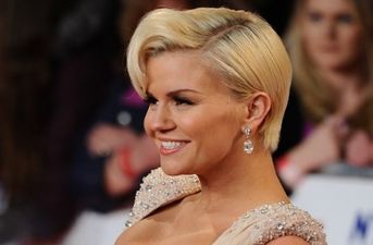 PICTURE: Singer Shows Off New Arrival On Magazine Cover