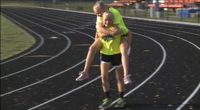 VIDEO: Twin Carries Injured Sister Across The Finish Line In 800m Race