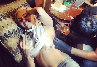 PICTURES: Miley Cyrus And Friends Get Matching Tattoos After ‘Joint’ Party… They’re Pretty Woof