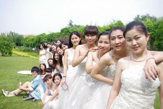 Forget The Cap And Gown, The Latest Graduation Garb Is A Wedding Dress…