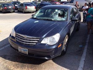 Woman Smashes Windshield to Save Baby From Hot Car