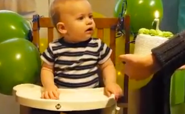 VIDEO: Baby’s First Birthday Means Faceplanting Into a Cake