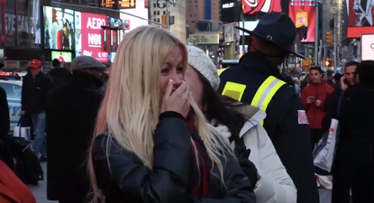WATCH: Footballer Brings New York’s Times Square To A Standstill For Flashmob Proposal