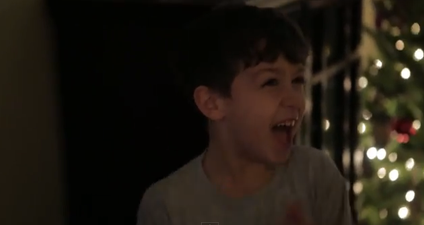 VIDEO: Child Catches Santa Delivering Presents On Camera