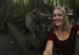 PICS: Woman Attempts Selfie With Monkey. Monkey Is NOT Impressed