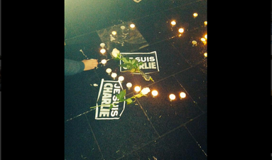 Crowds Gather At Dublin’s Spire In Tribute To Murdered French Journalists