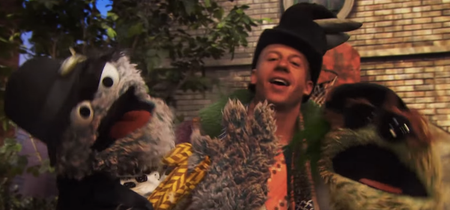 WATCH: Macklemore’s Street Credit Goes Through The Roof As He Duets With Oscar The Grouch
