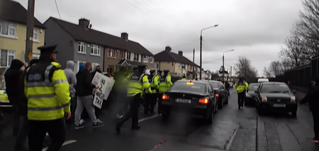 WATCH: “Little Midget Parasite” – Water Protestors Heckle President Higgins