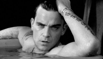Robbie Williams performed on The X Factor but all people can talk about is what he wore
