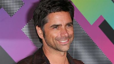 John Stamos and wife Caitlin welcome their first child together