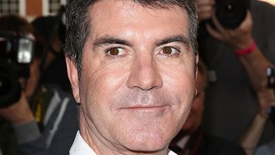 Simon Cowell Hints at Louis Walsh Departure on Twitter