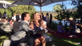 WATCH: This Man Does NOT Want His Girlfriend To Catch The Wedding Bouquet