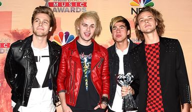 5SOS postpone concert after drummer Ashton Irwin rushed to hospital
