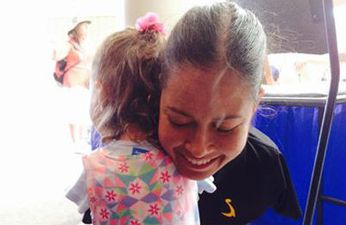 PIC: There’s An Incredible Reason Why This Photo Of Strangers Hugging Has Gone Viral