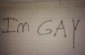 PIC: These Parents Had The BEST Response To The Homophobic Vandals Who Graffitied Their House