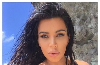 Kim Kardashian Wears a Cape Dress and We Love It