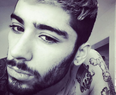 Zayn Malik Cosies Up To Mystery Blonde On Instagram
