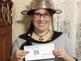 Woman Wins Right to Wear Colander In Driving License Photo