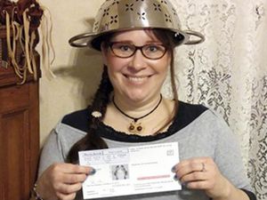 Woman Wins Right to Wear Colander In Driving License Photo