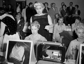 A Photographer is Photo-Shopping Herself into Other People’s Memories for Good Reason