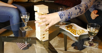 WATCH: This Jenga Based Drinking Game Is Too Intense To Handle