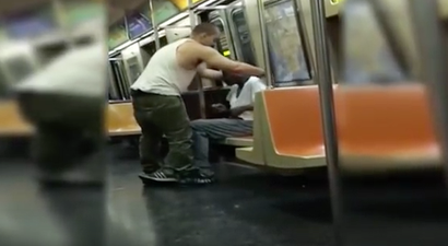 A Video of a Stranger Helping a Homeless Man on the Subway is Going Viral