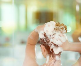 This Could Be Why Your Hair Always Feels Greasy (It’s Not Your Conditioner)