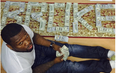 Posing With Piles Of Cash Is Getting ‘Bankrupt’ 50 Cent Into Trouble
