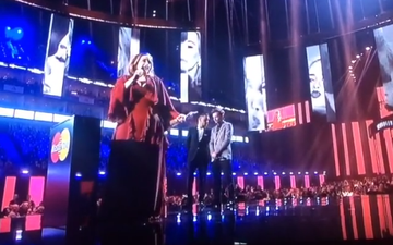 WATCH: Adele Just Paid Tribute To Kesha While Accepting Her Brit Award