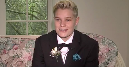A gay student was refused entry into prom because she was wearing a suit