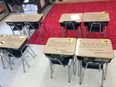 Teacher writes inspirational messages on student’s desks on exam day
